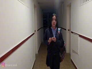 I find my neighbor in her school uniform outside her house.